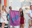 New students unfurl the Class of 2020 standard during the President’s Welcome Convocation at the Alumni Greek Theatre on August 31, 2016. From left: Kate Fox (Texas), Jean Baptiste Kwizera (Rwanda), Kristen Sauceda (California) and Cortlandt Nelsen (Oregon).