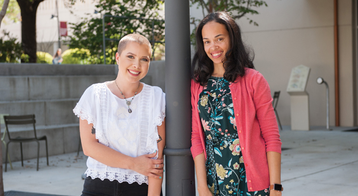 School of Education Counseling Professor Marcina Riley (right) has been a key support for Steinmuller (left), helping her explore the effects of trauma in the months following the shooting. (Photo by Coco McKown '04, '10) 