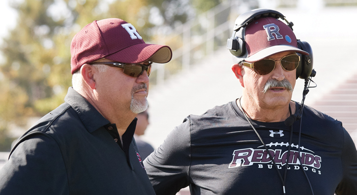 Athletics Director Jeff Martinez (left), who has been at the U of R for 35 years, is one of many longtime staff members devoted to U of R student-athletes. (Photo by William Vasta)